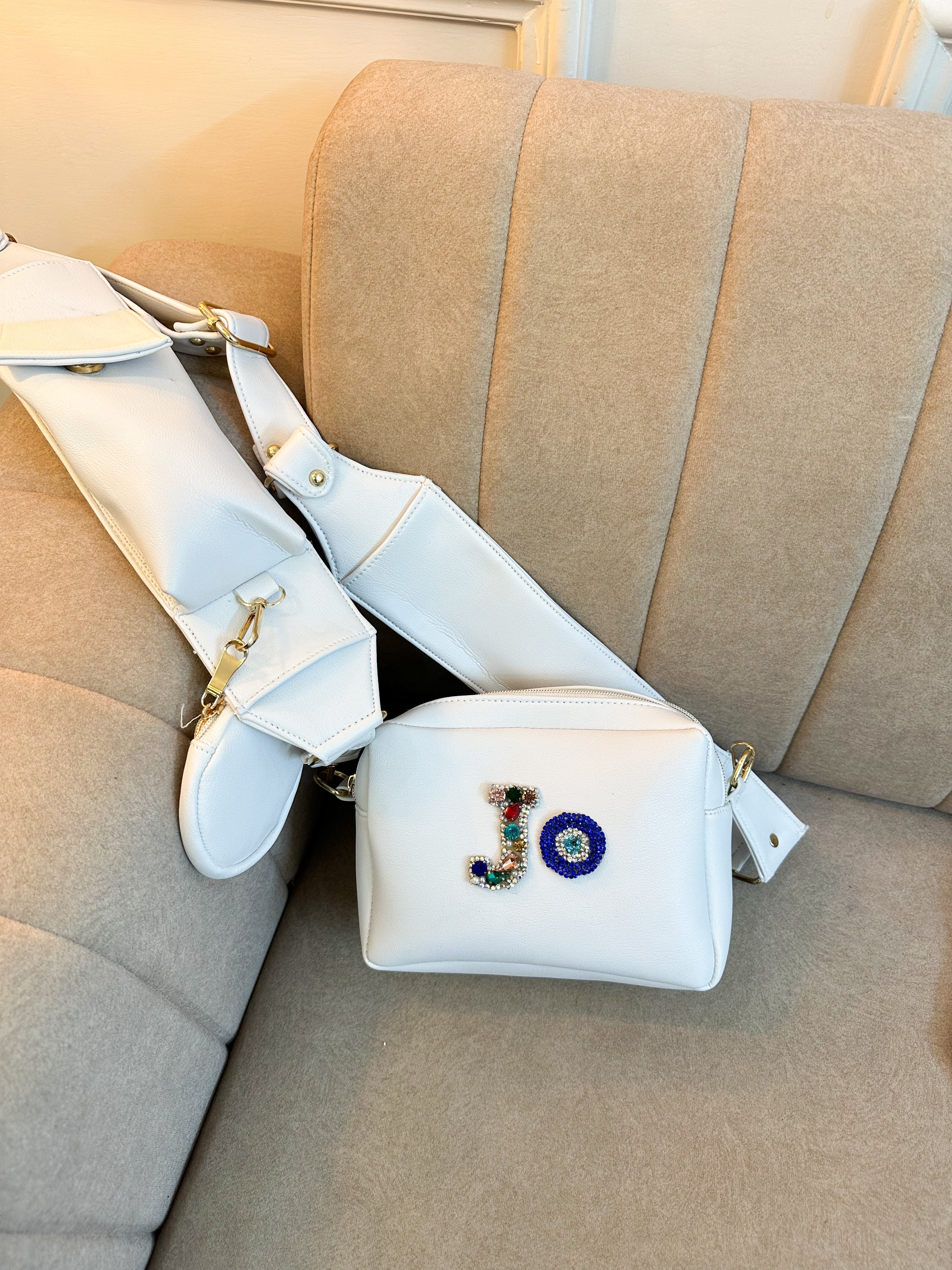 Nivel White dual compartment Bella sling