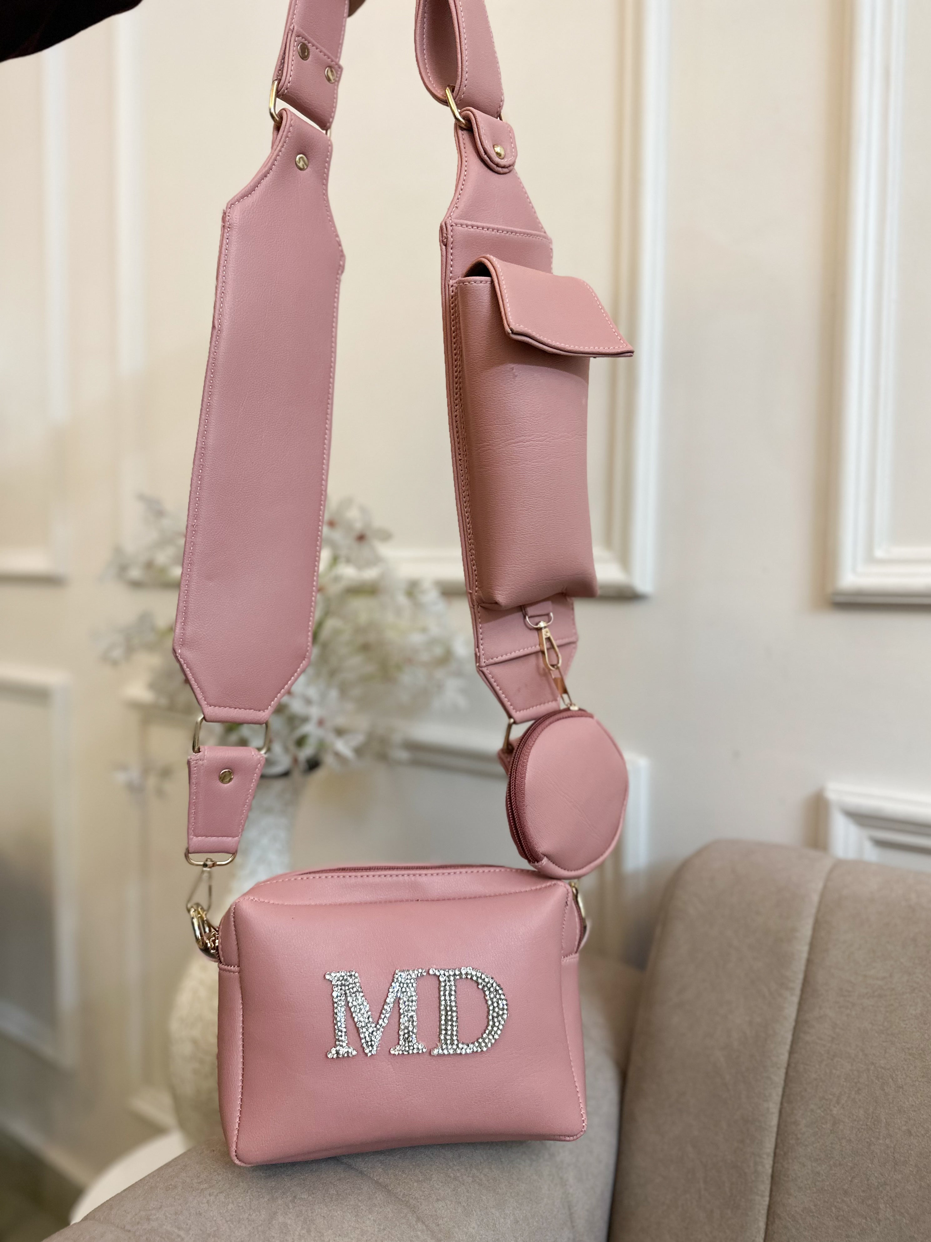 Nivel Pink dual compartment Bella sling